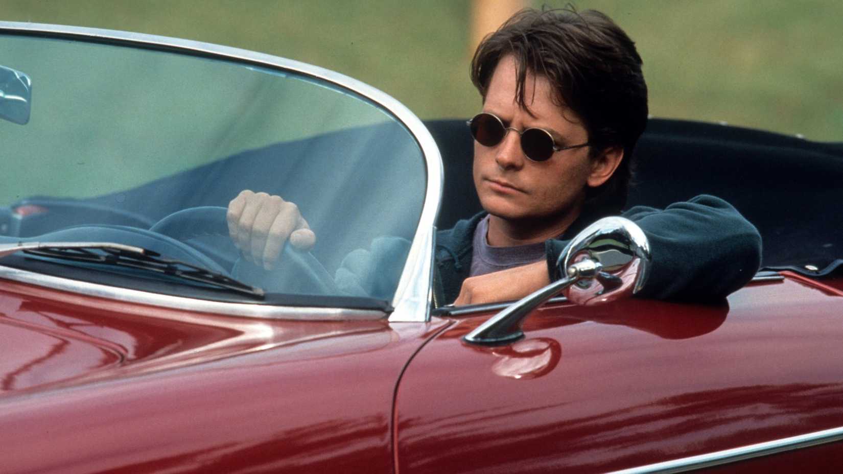 Dr. Stone looks angry while sitting in his car in Doc Hollywood