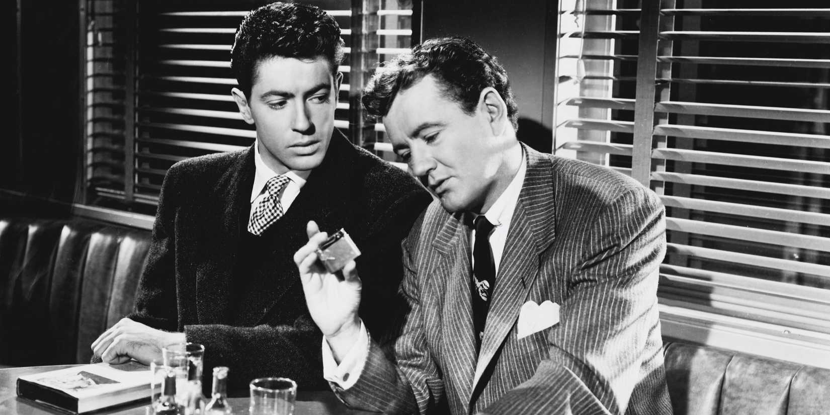 Farley Granger and Guy Haines on a train in Stranger on a Train