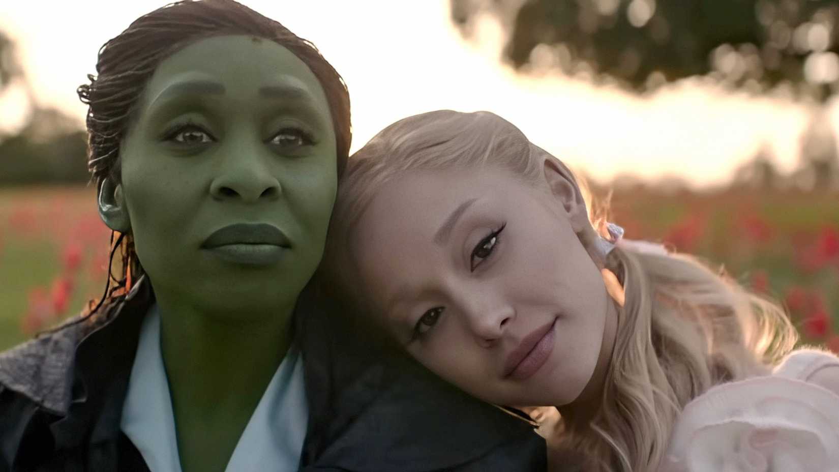 Glinda leaning her head on Elphaba's shoulder in Wicked For Good