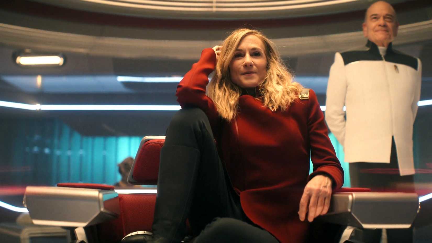 holly hunter sitting in captain s chair starfleet acaedemy captain ake