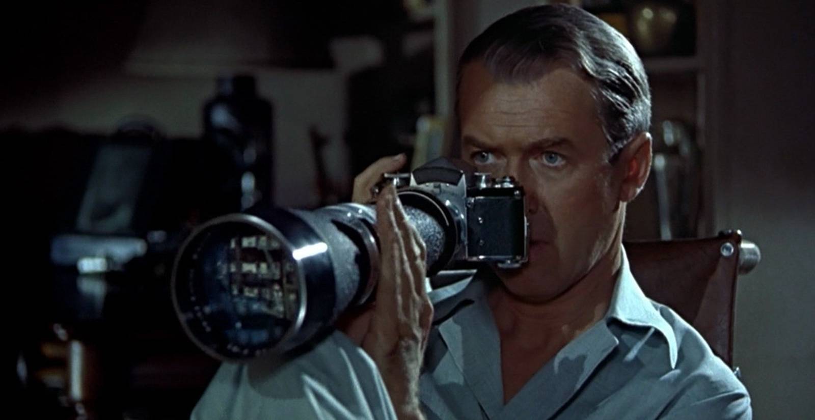 James Stewart looking through a lens in Rear Window