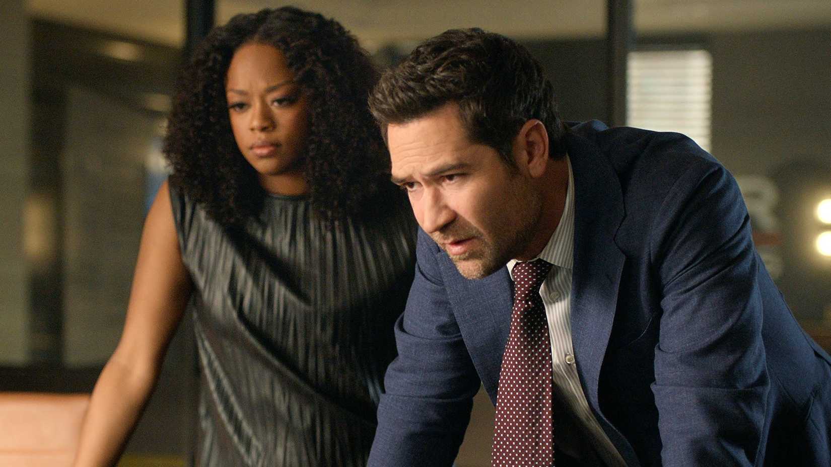 Izzy Letts and Mickey Haller look worried in The Lincoln Lawyer Season 4 episode 4