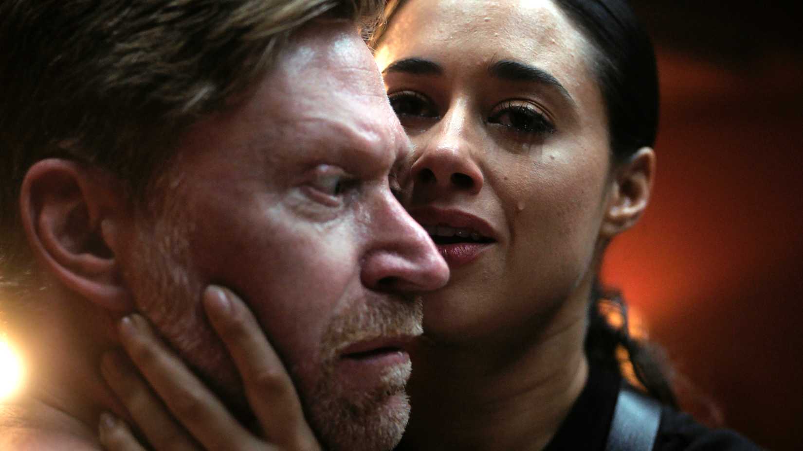 Cross Season 2 Finale Ending & Plot Twist Explained: What's Next For Alex 1 Jeanine Mason's Rebecca crying while holding someone by their face in Cross season 2