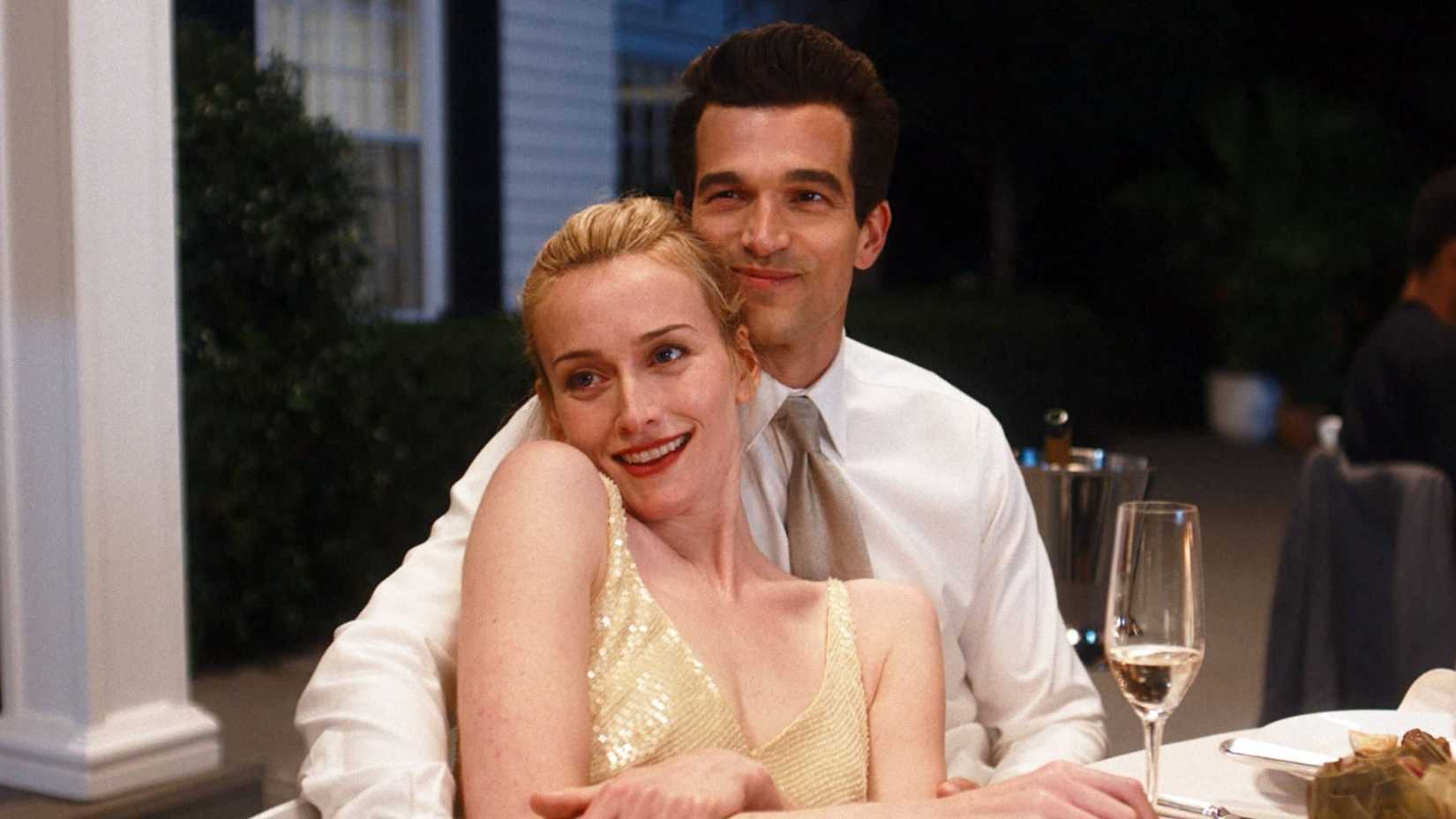 John and Carolyn embracing each other in Love Story
