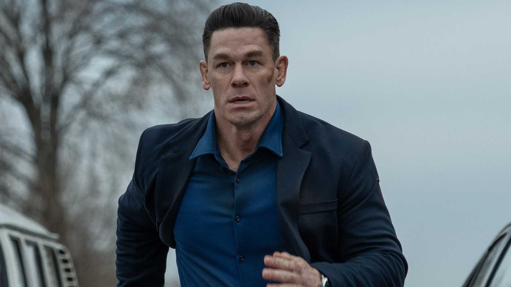 John Cena running down the street looking worried in Matchbox
