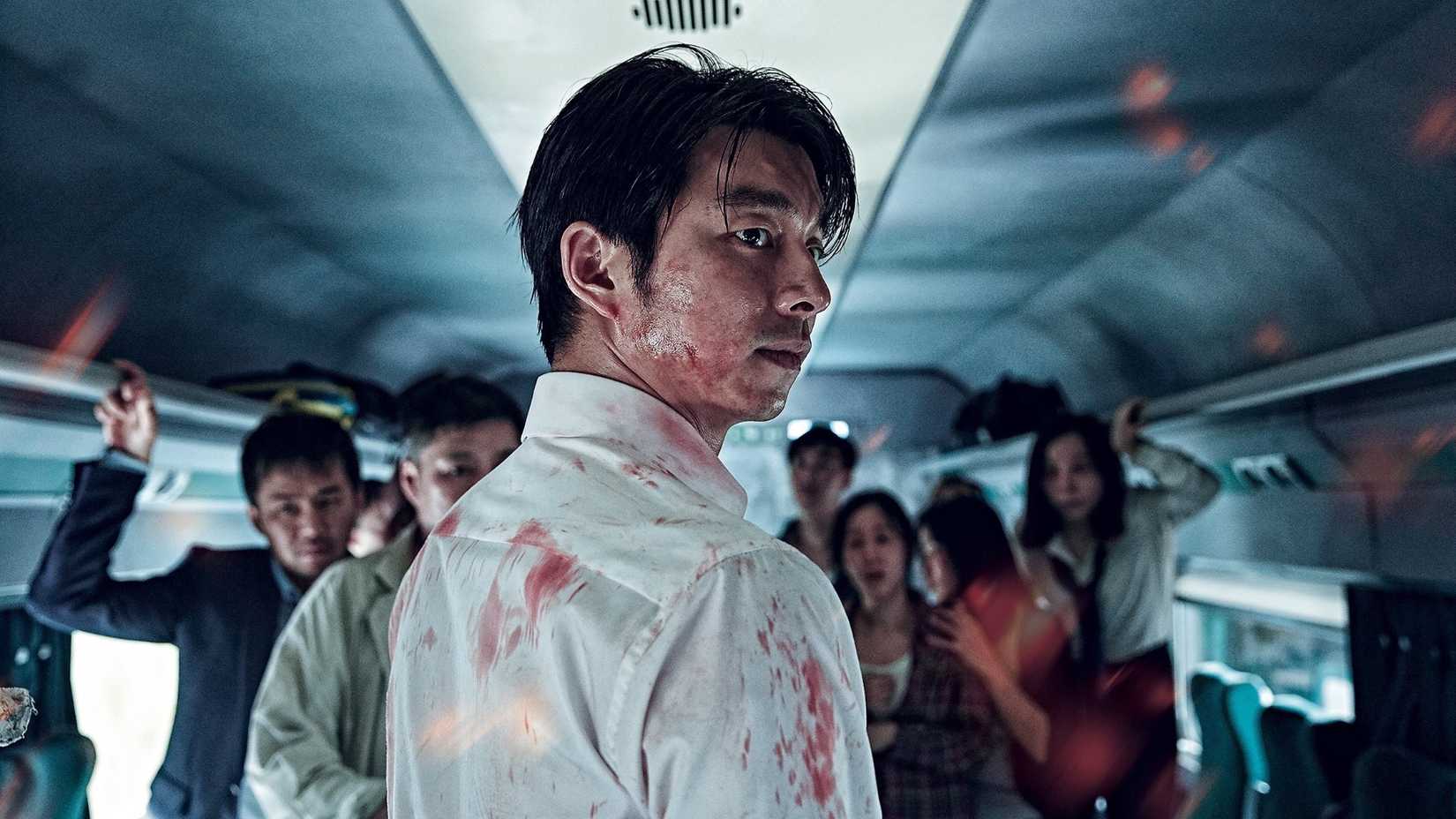 A man covered in blood in the Korean Movie Train To Busan.