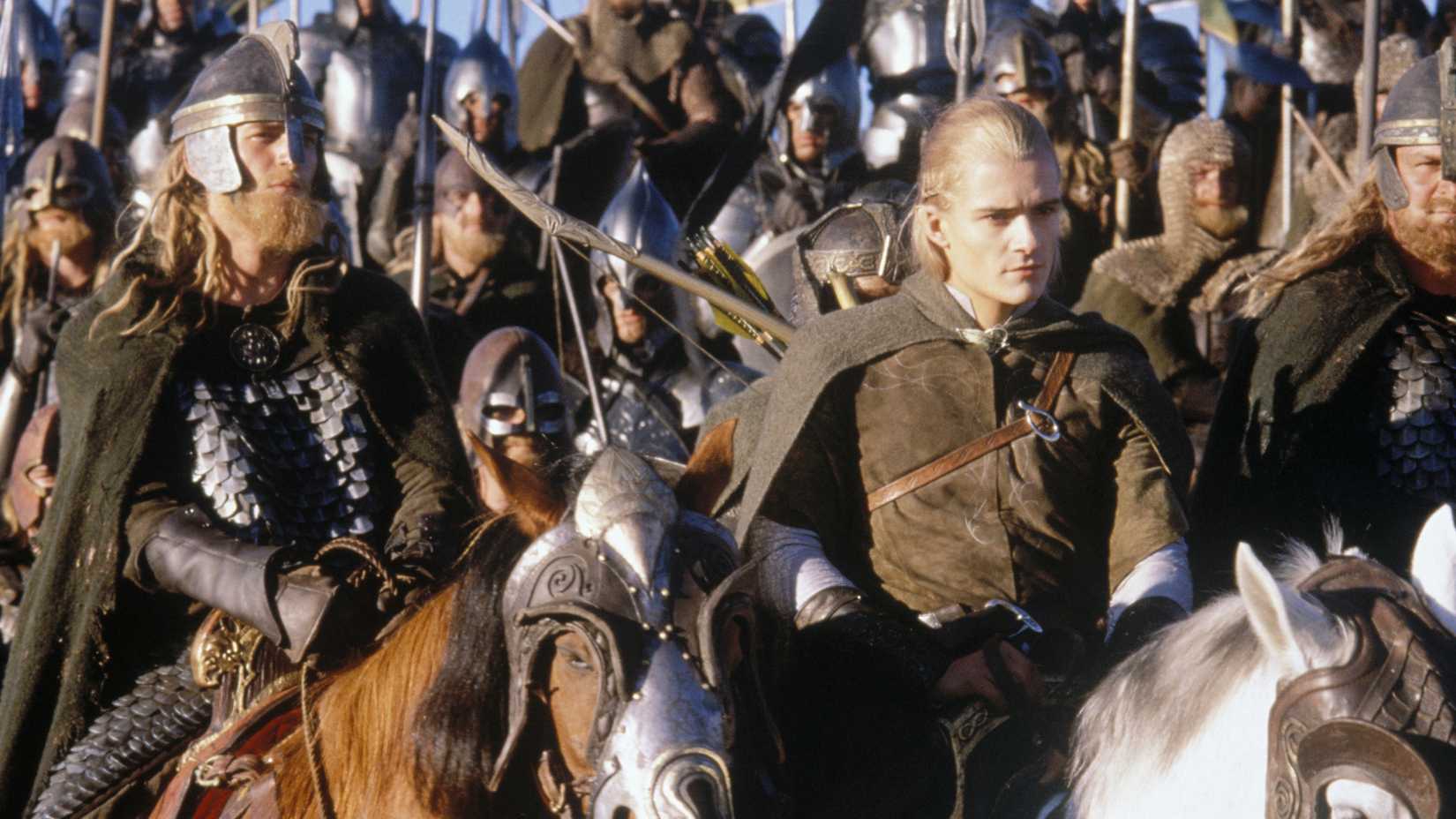 Legolas riding with an army of men in The Lord of the Rings.