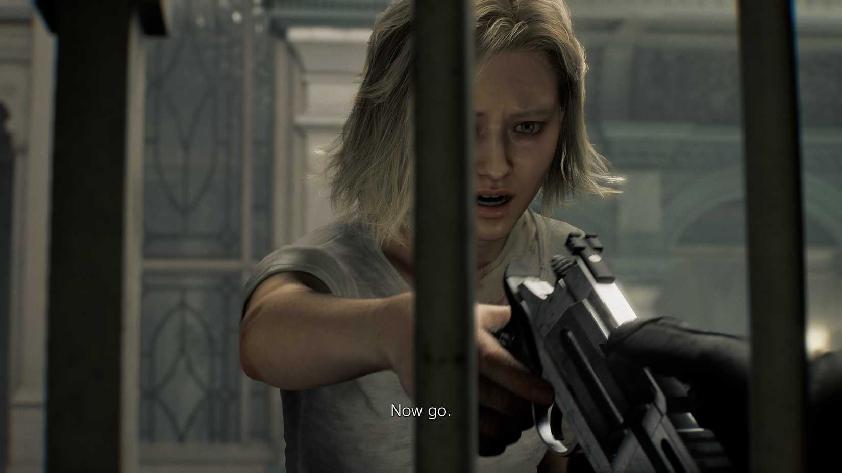 Leon Passing His Gun To Grace