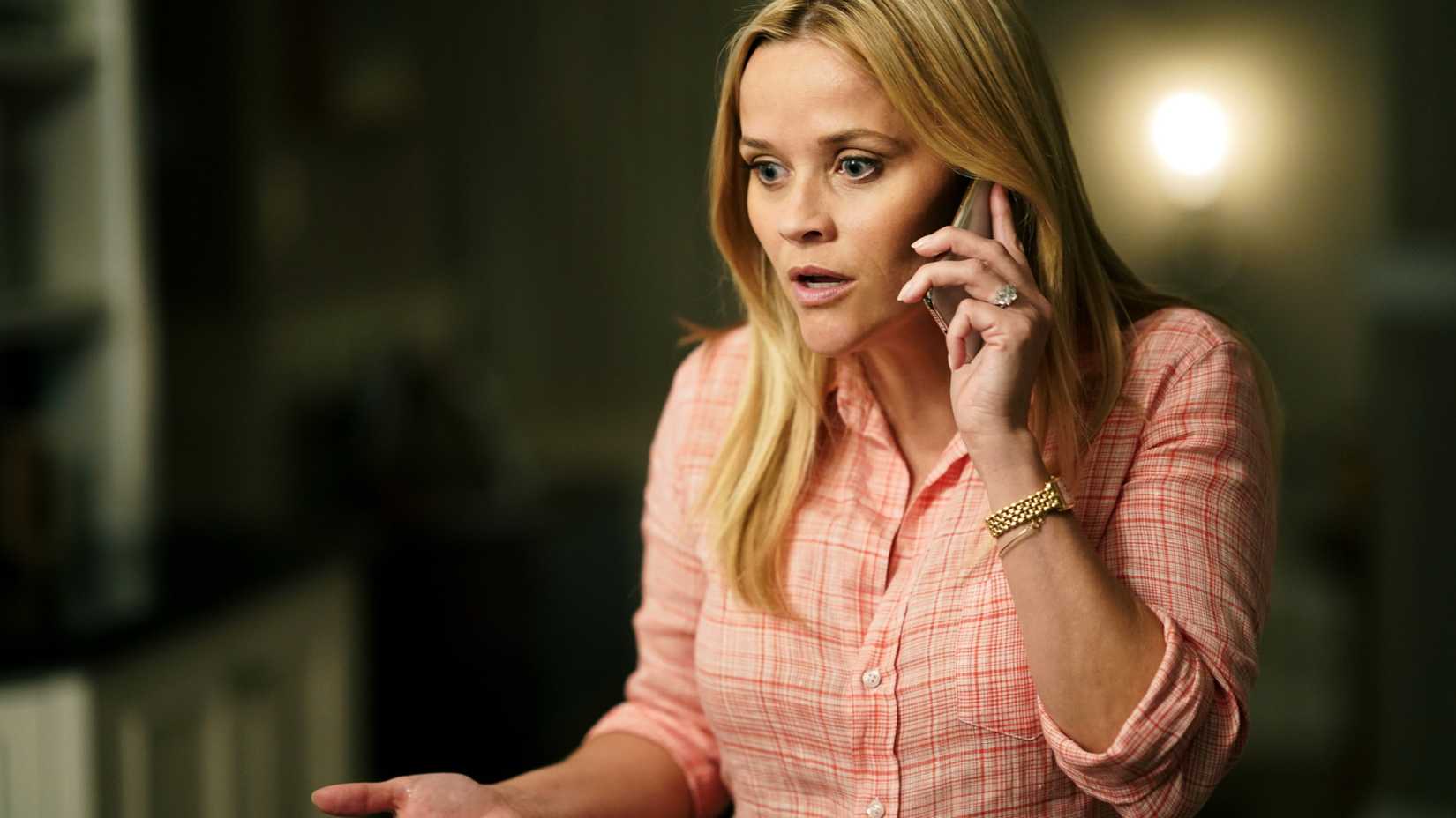 The Iconic HBO Series With An A-List Cast 1 Madeline Mackenzie (Reese Witherspoon) on the phone looking distressed in Big Little Lies season 2