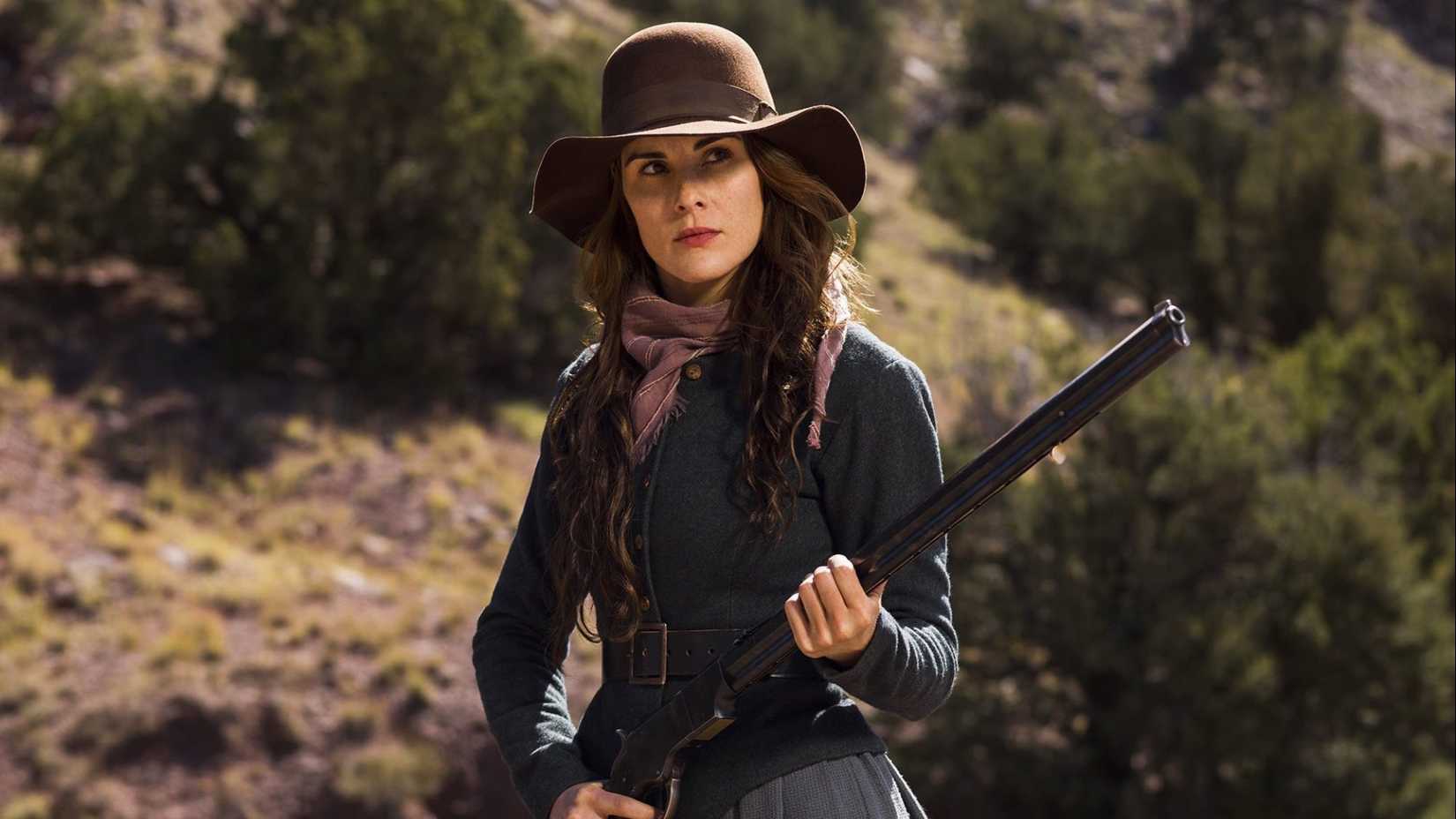 A western woman holding a gun in Netflix's Godless.