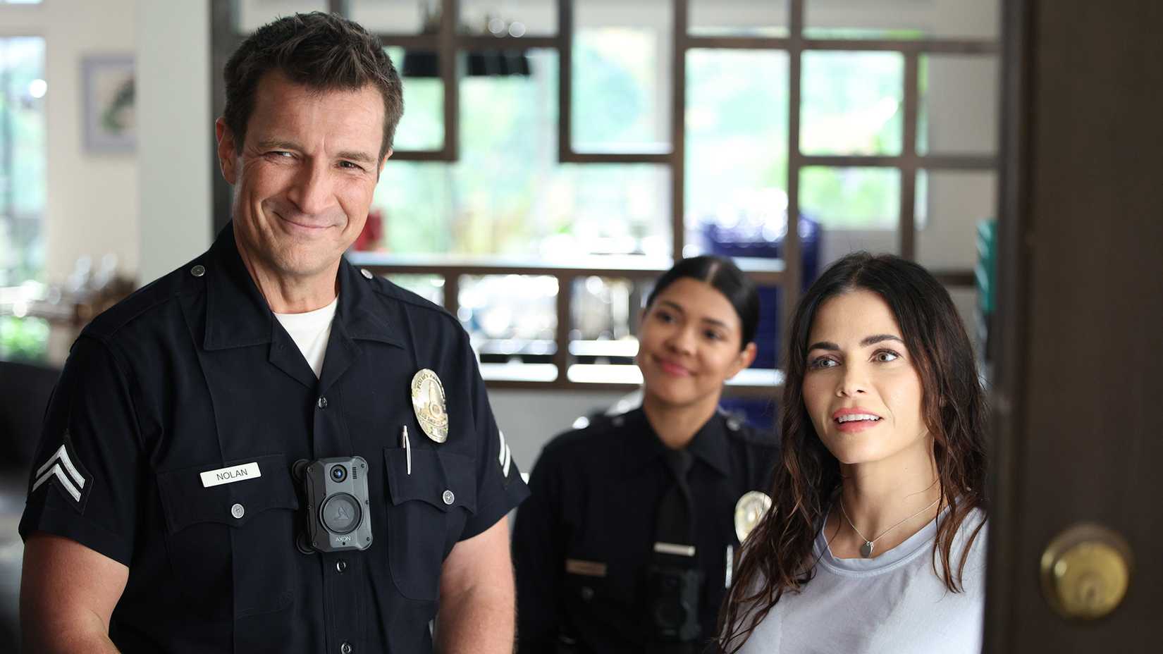 Nolan and Bailey smiling in an episode of The Rookie