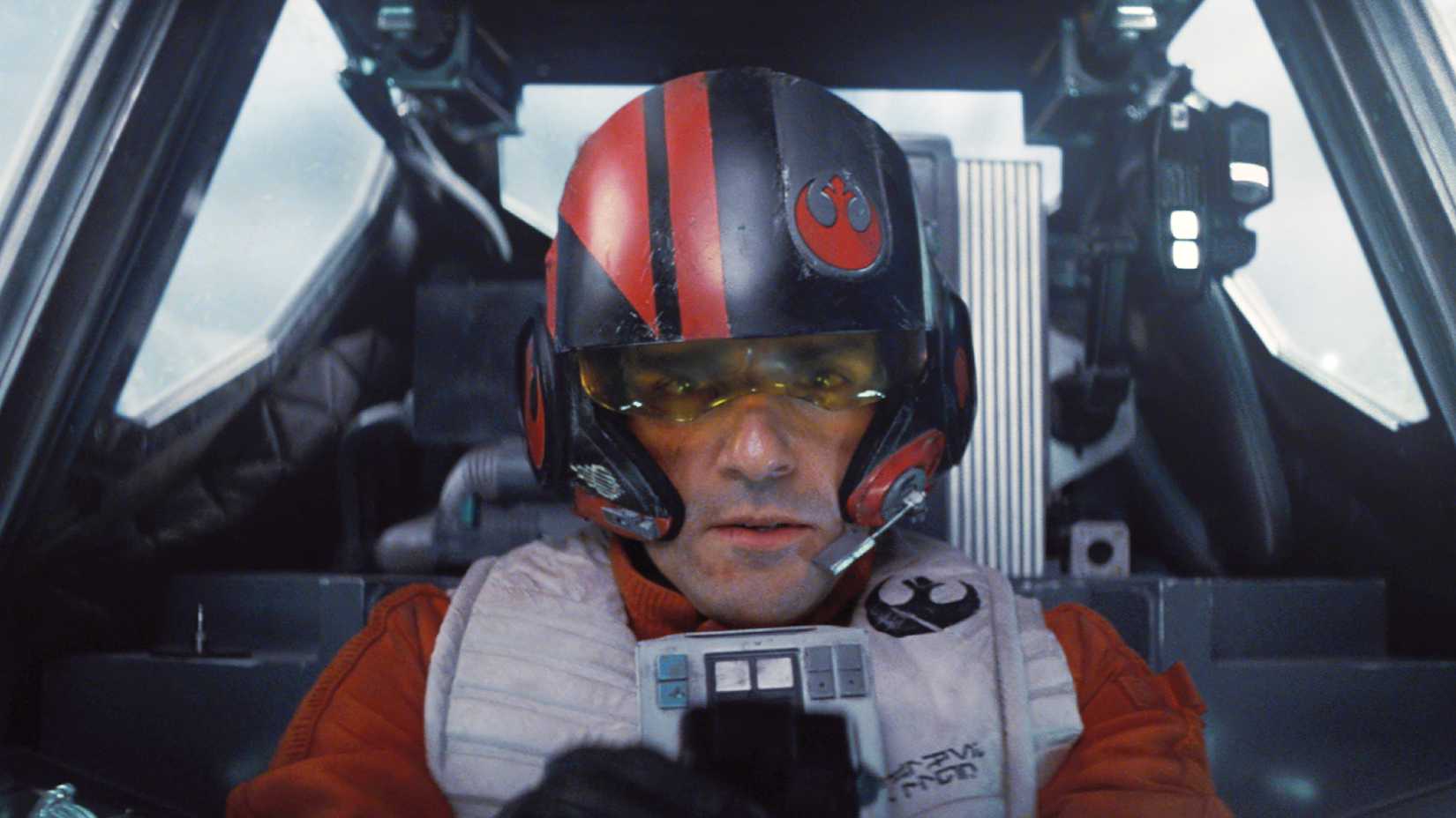 Oscar Isaac looking focused as Poe Dameron in Star Wars The Force Awakens