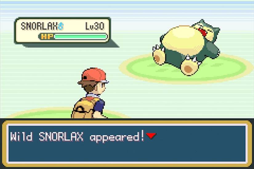 Pokemon FireRed LeafGreen character battling a Snorlax
