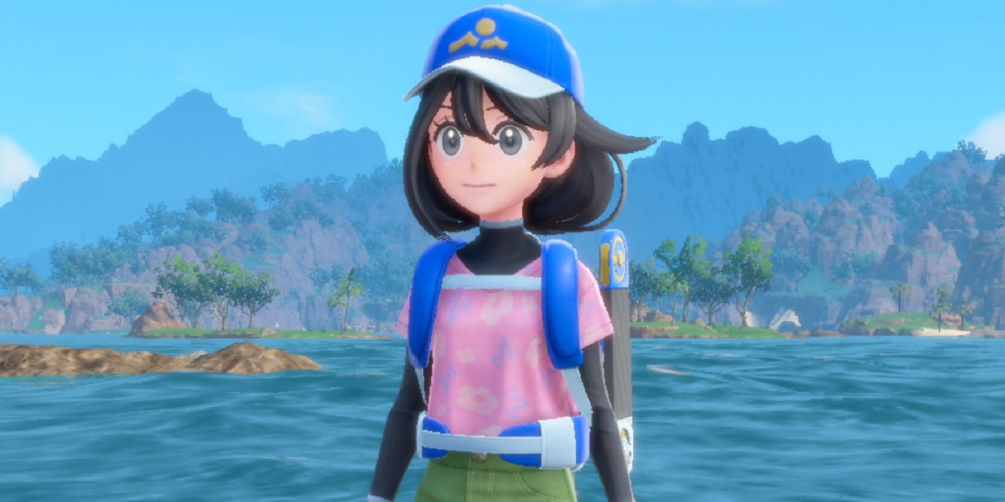 Pokemon winds and waves character standing in front of water