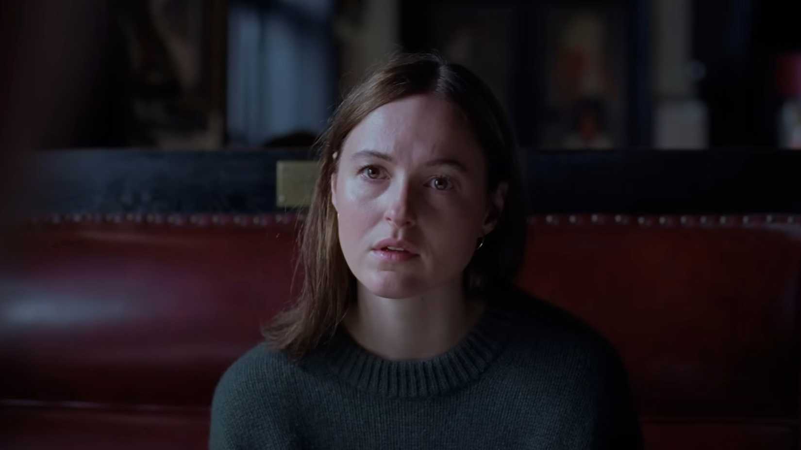 Renate Reinsve looking quizzically past the camera in Sentimental Value