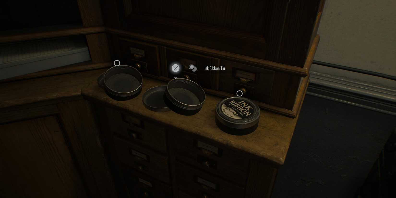 Resident Evil Requiem Ink Ribbon and two empty tins