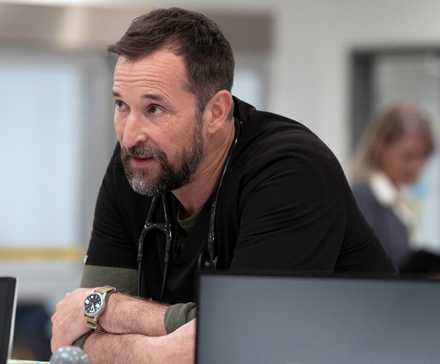 A Water Park Disaster Is Heading For PTMC 1 Robby leaning over a desk speaking in The Pitt season 2