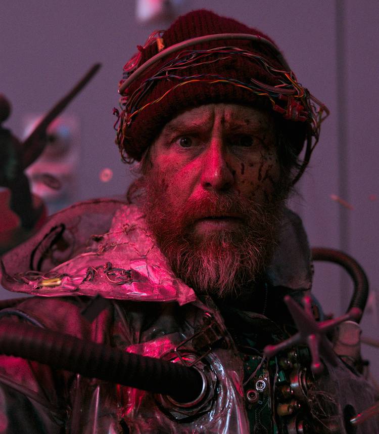 sam rockwell s man looking worried as items float around him in good luck have fun don t die