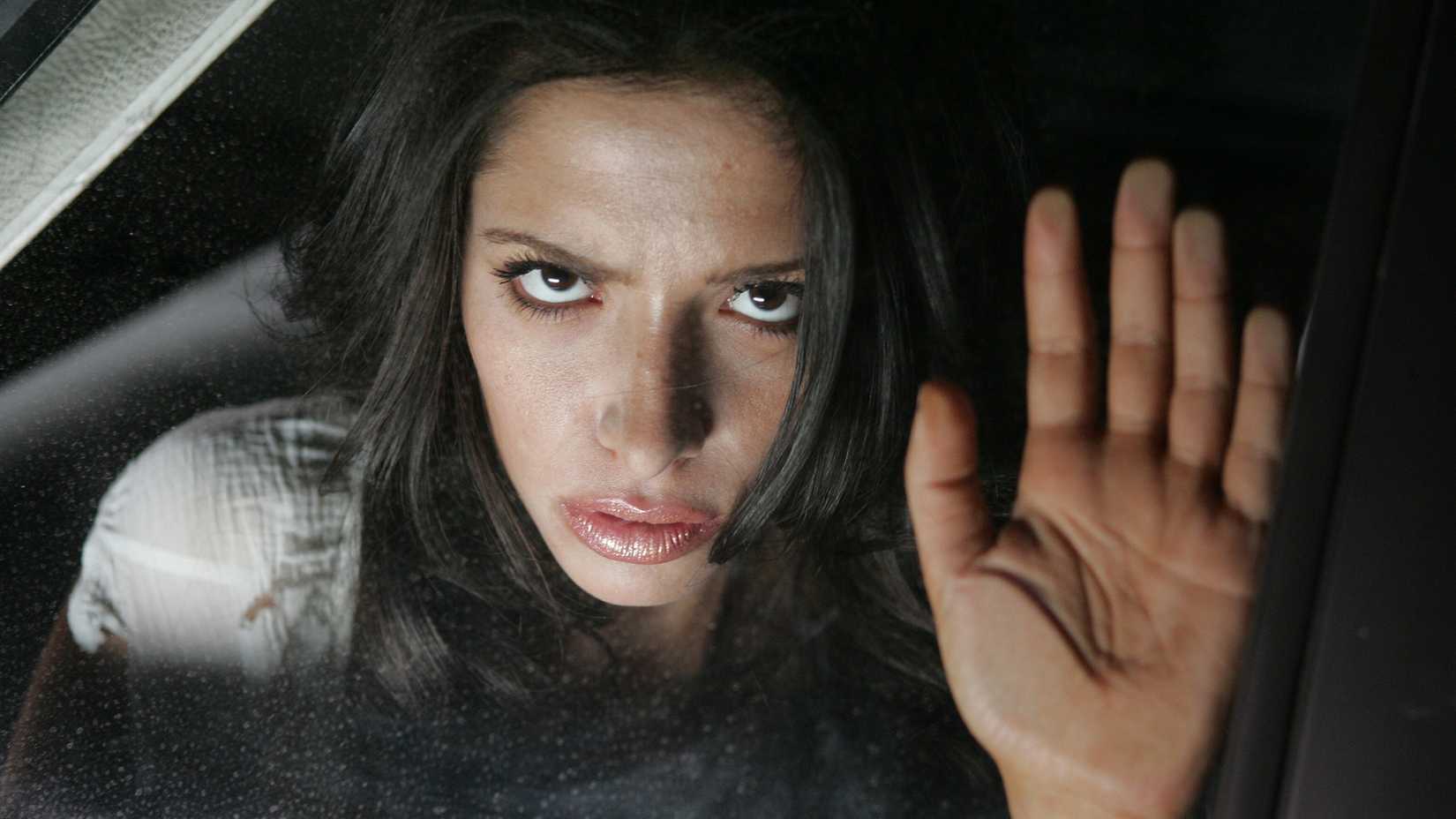 sarah shahi as the woman in white in supernatural