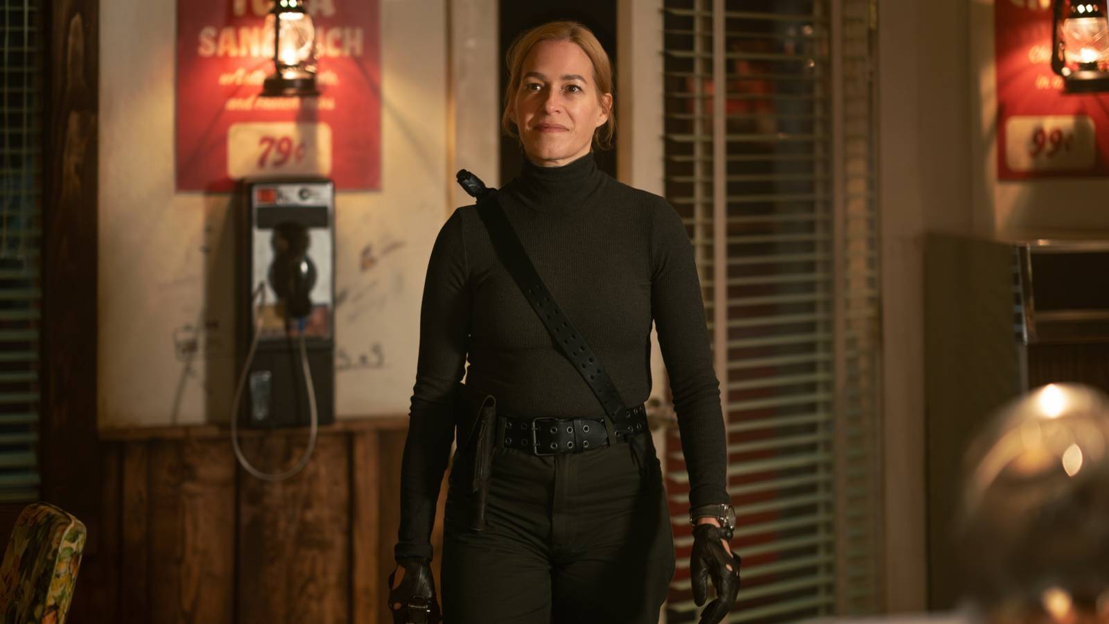 Franka Potente as Irene wearing a black tactical suit in Dark Winds season 4