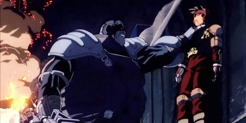 O herói de Spriggan (1998) preso contra a parede por um vilão