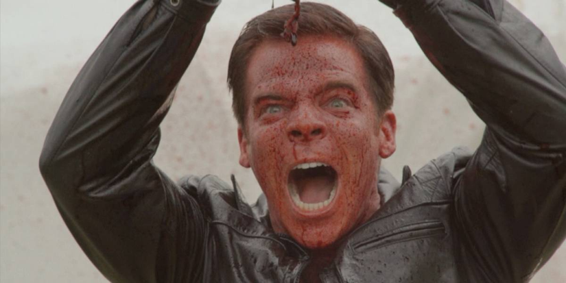 Gregory James Cohan yelling angrily while covered in blood in The VelociPastor
