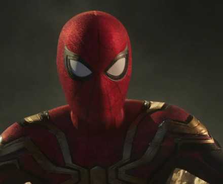 Tom Holland's Peter Parker being held by Sandman in Spider-Man: No Way Home