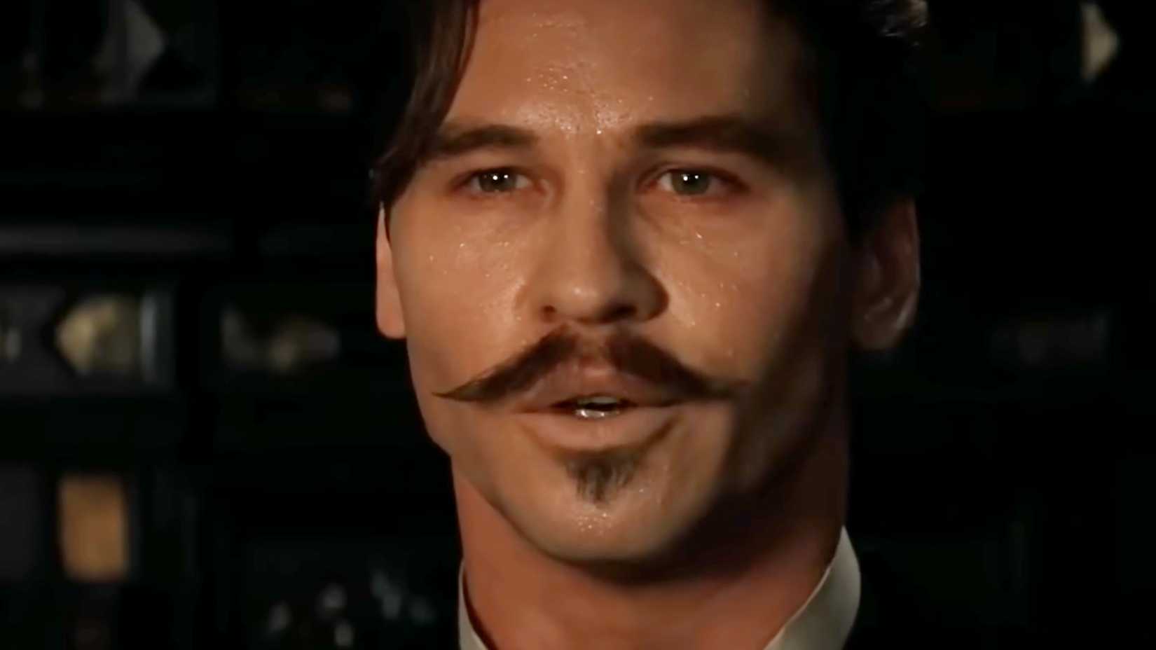Val Kilmer como Doc Holliday em Tombstone