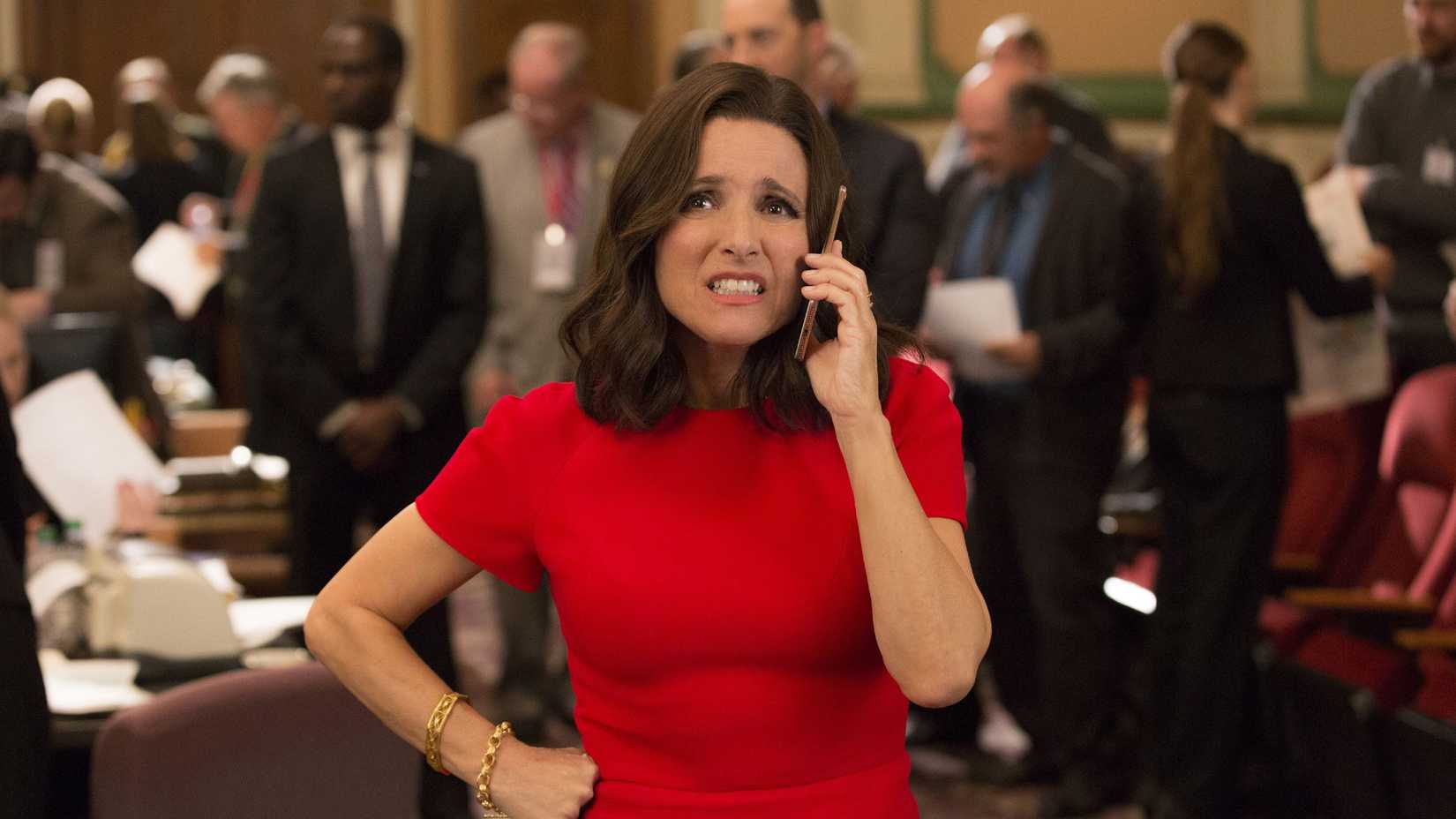 Veep still featuring Julia Louis Dreyfus as Selina Meyer in a red dress looking confused.