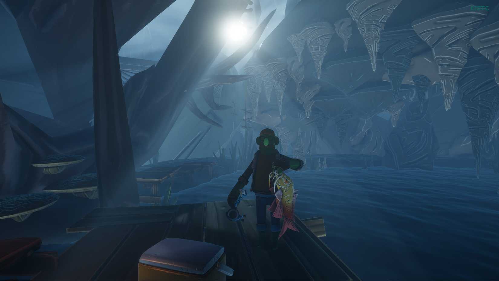 Voodoo Fishin shadow man holding up a fish by the water