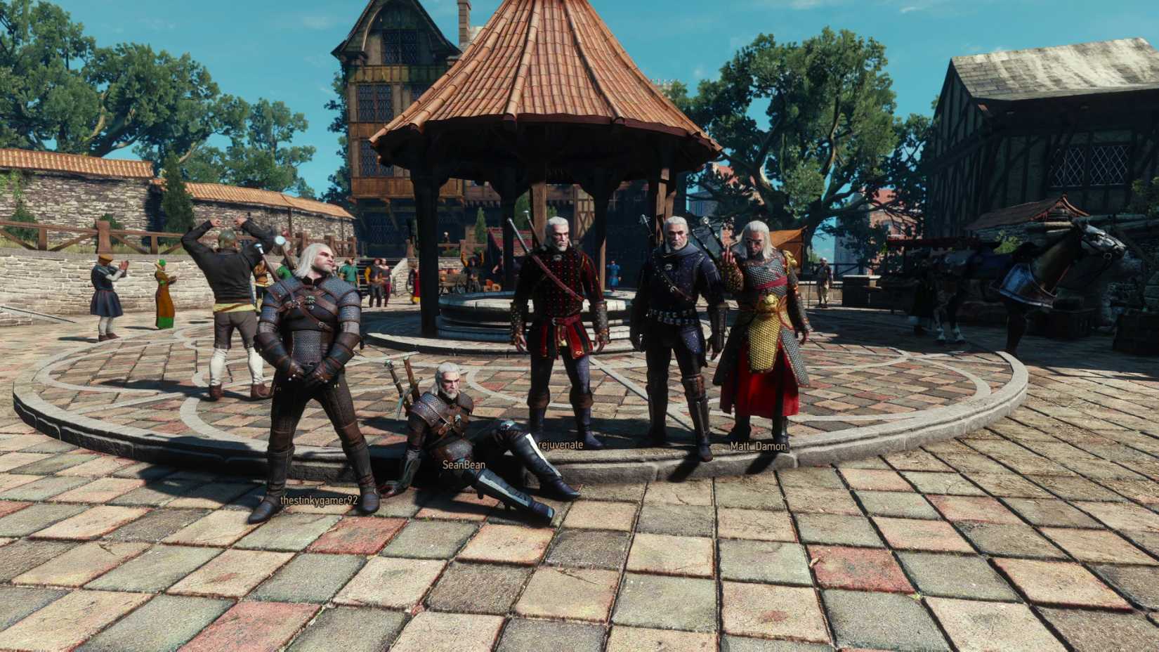 Several Geralts hang out in the town center in The Witcher 3 Multiplayer mod