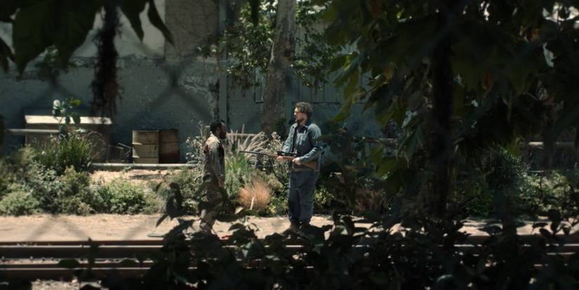 a distant shot of gary shooting ennis in paradise season 2