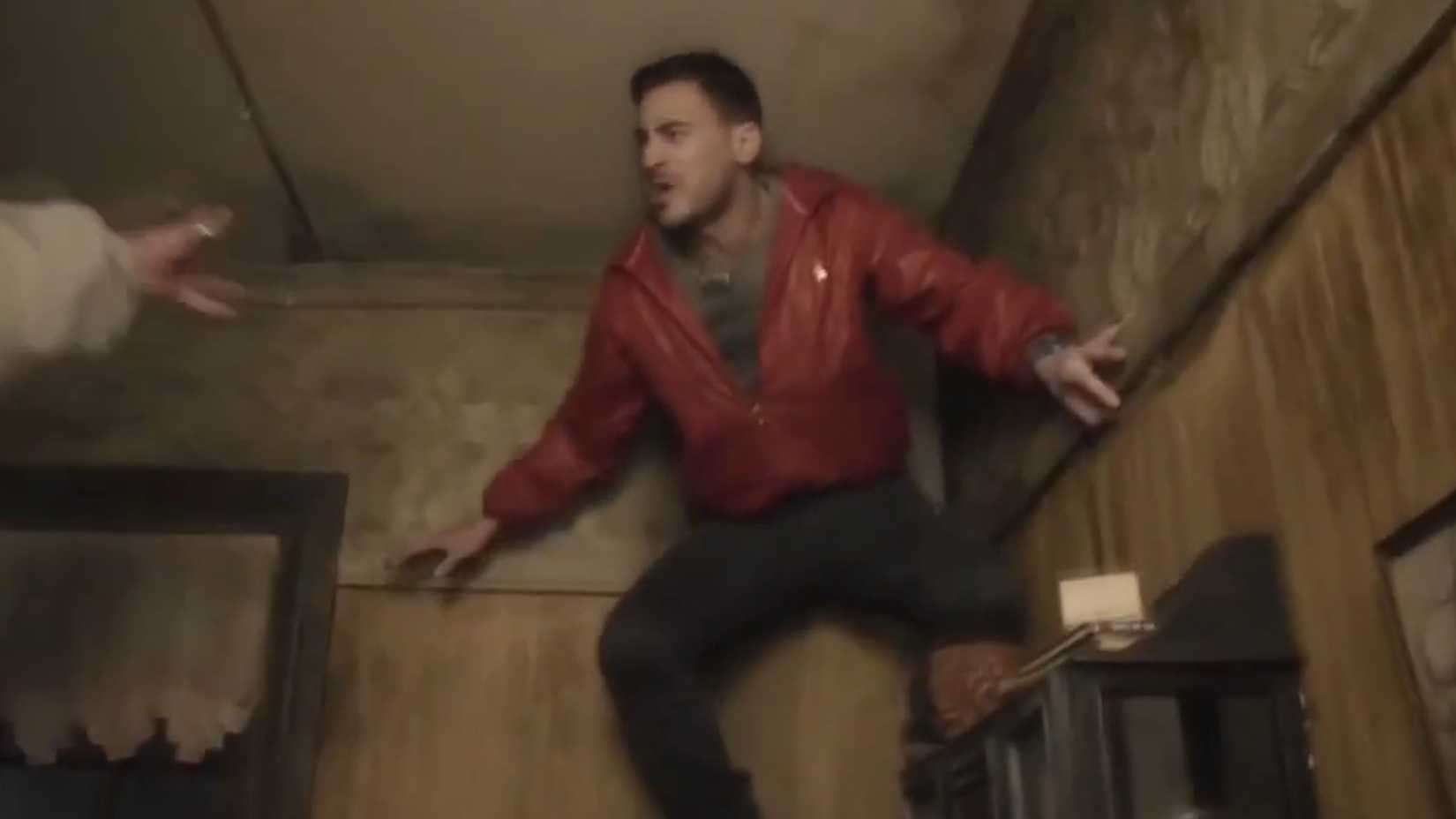 A vampire against the wall while having an argument in What We Do In The Shadows movie