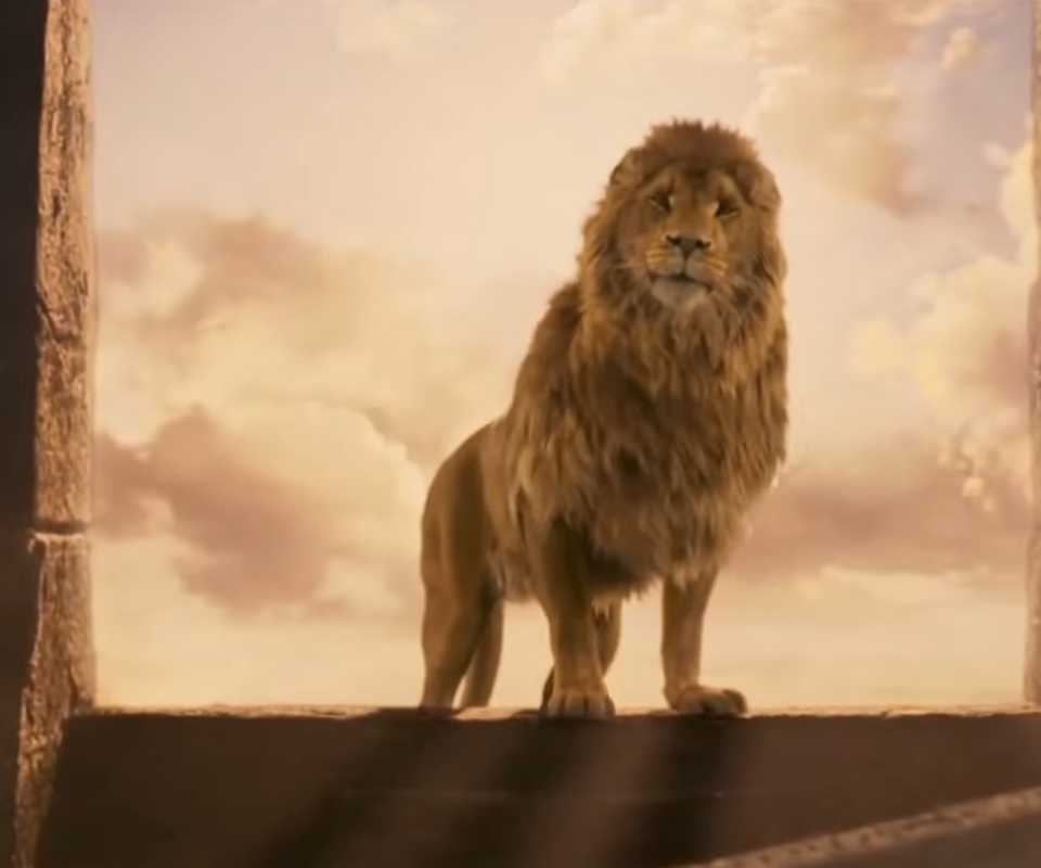 Aslan with the sunrise behind him in the chronicles of narnia the lion the witch and the wardrobe