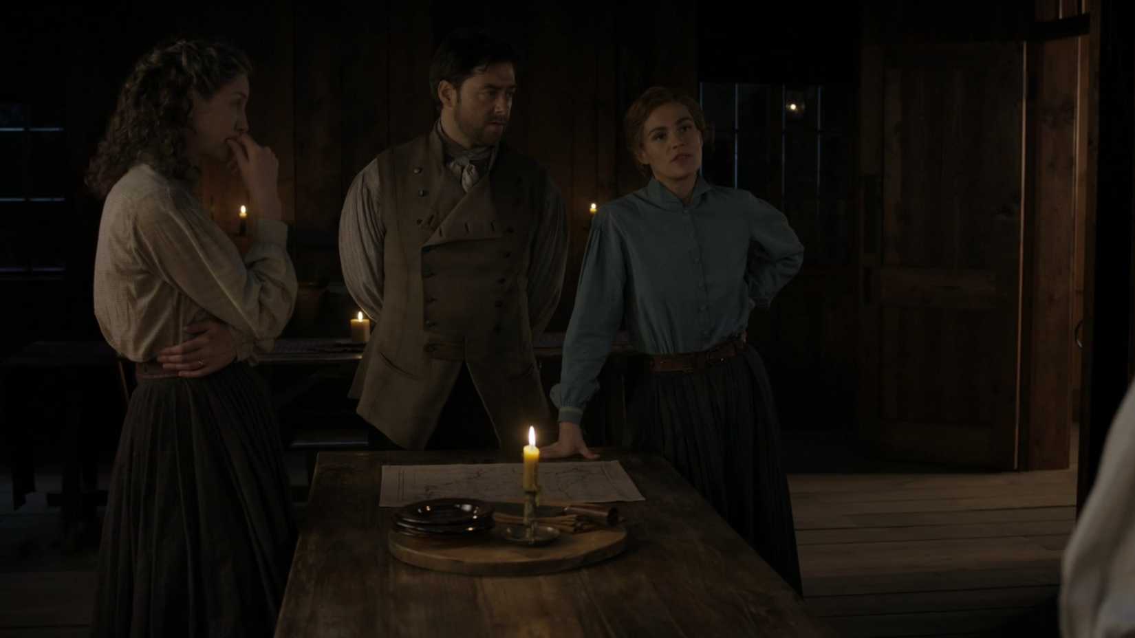 The Truth About Captain Cunningham Revealed 3 Brianna, Roger, and Claire standing in the kitchen talking in Outlander season 8