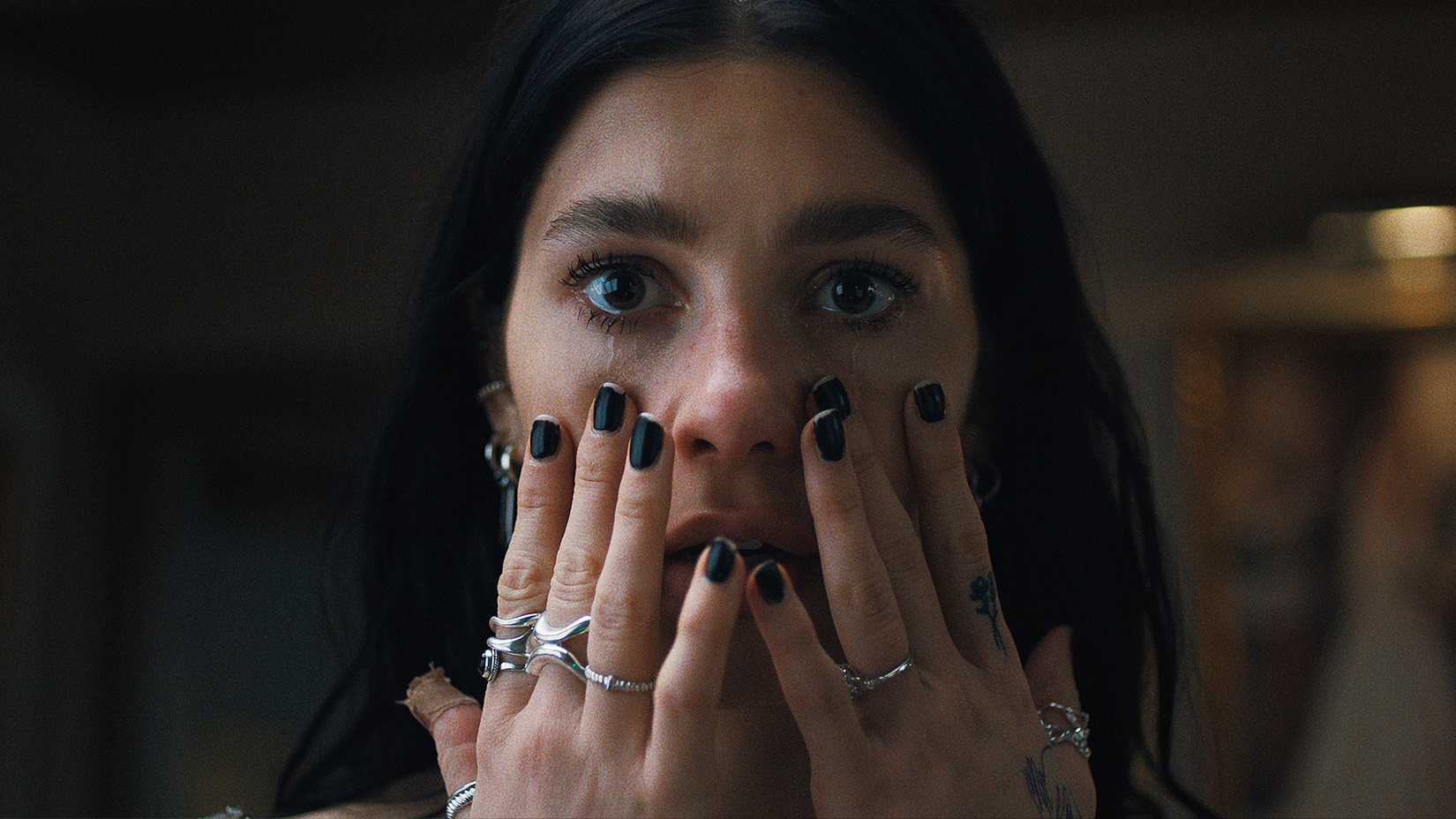 camila morrone as rachel harkin in something very bad is going to happen on netflix