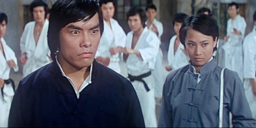 Carter Wong's 10 Best Martial Arts Movies, Ranked 1 Carter Wong and Angela Mao surrounded by fighters in The Tournament