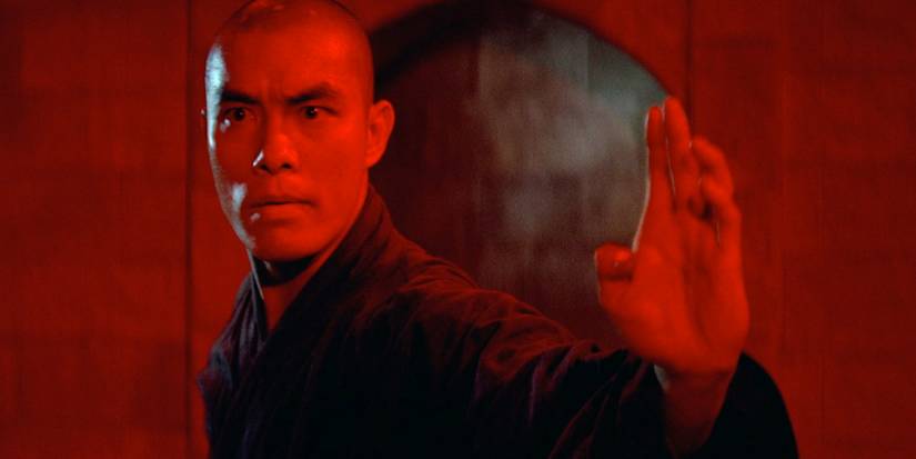 Carter Wong in red light in The 18 Bronzemen