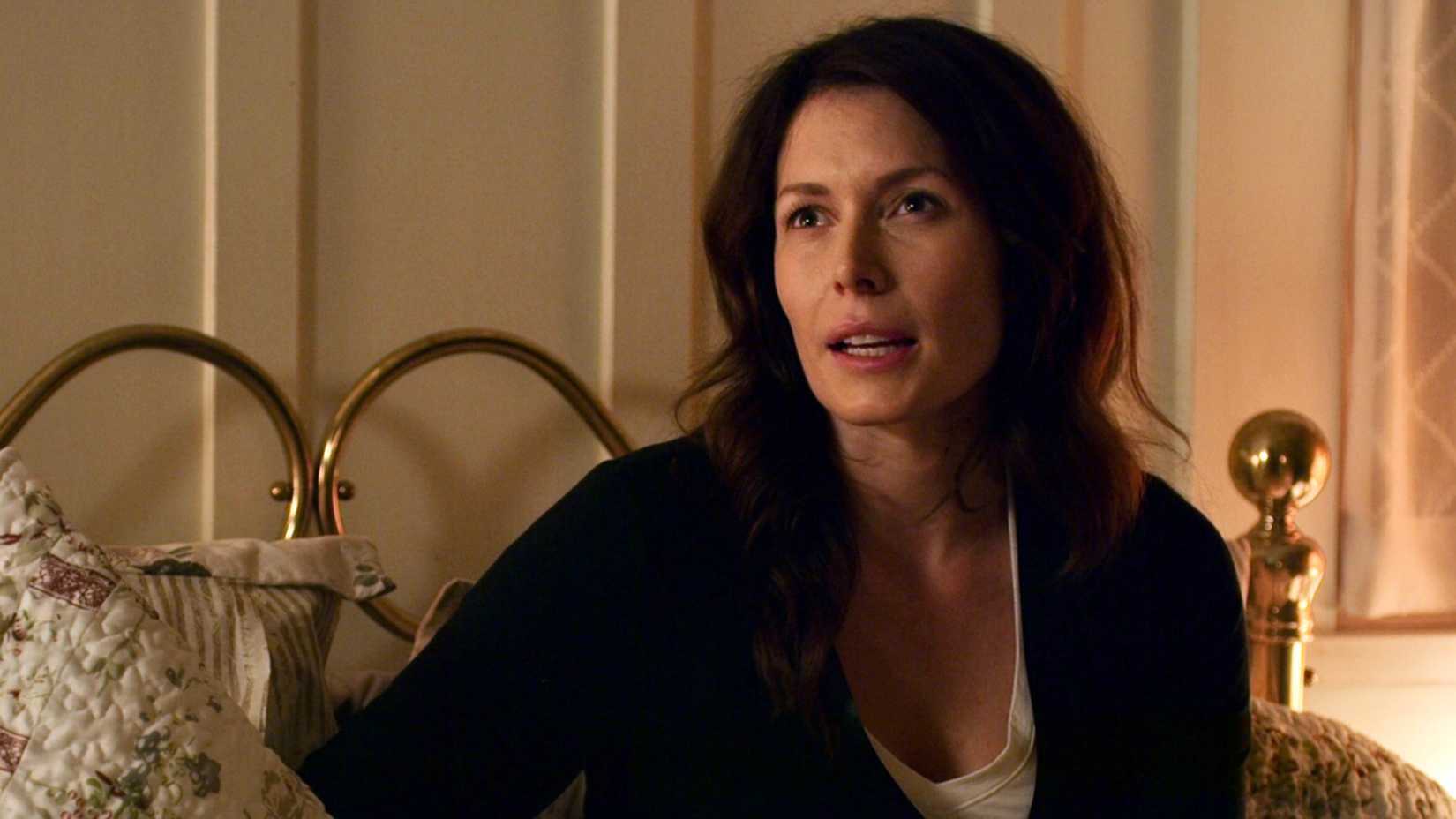 Charmaine looks upset while in bed in Virgin River