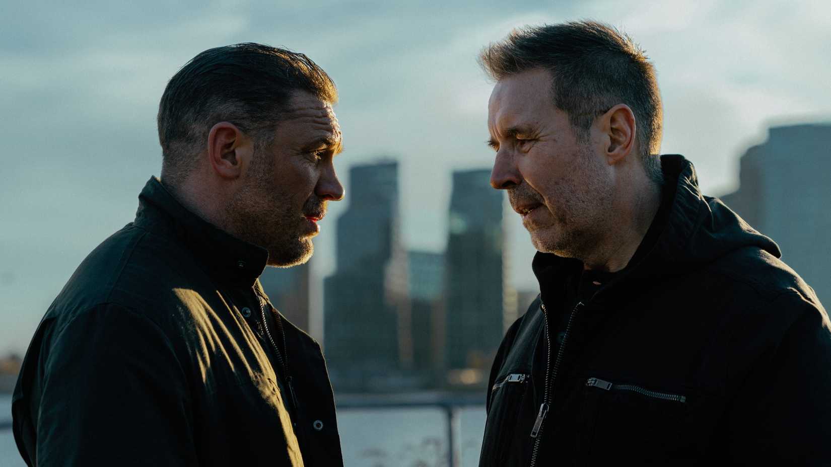 10 TV Shows We Thought Would Be The Next Sopranos 4 Two characters in profile in front of a cityscape in the crime drama MobLand.