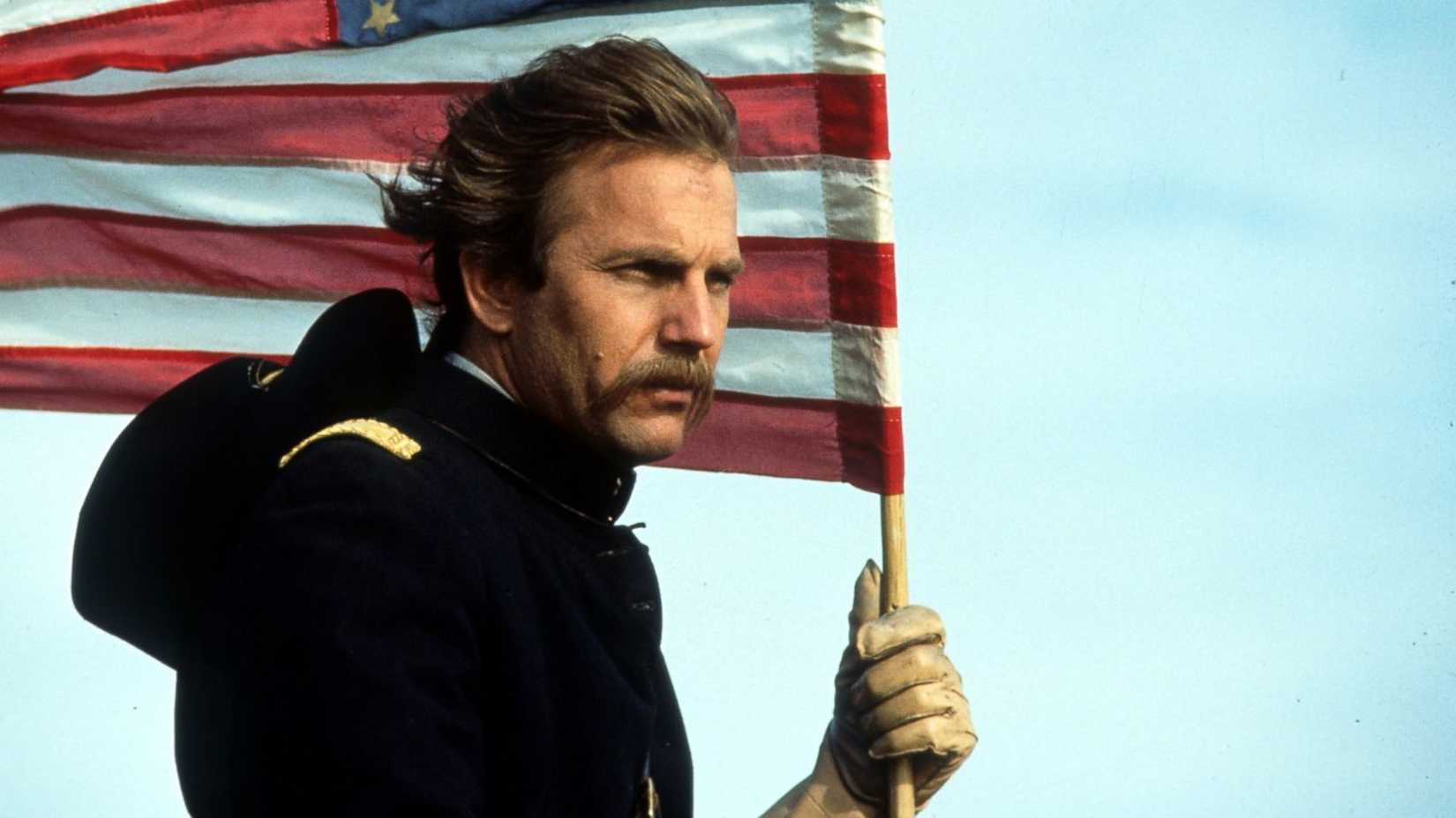 Kevin Costner holds a flag in Dances with Wolves