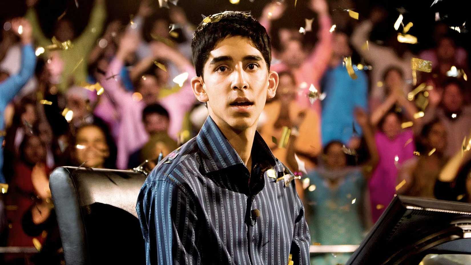 dev patel as jamal malik on the game show in slumdog millionaire