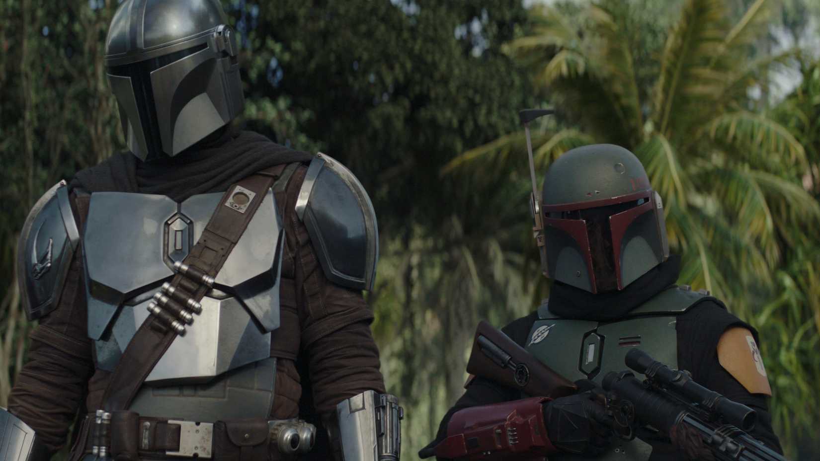 Din Djarin and Boba Fett standing next to each other in The Mandalorian season 2, episode 7