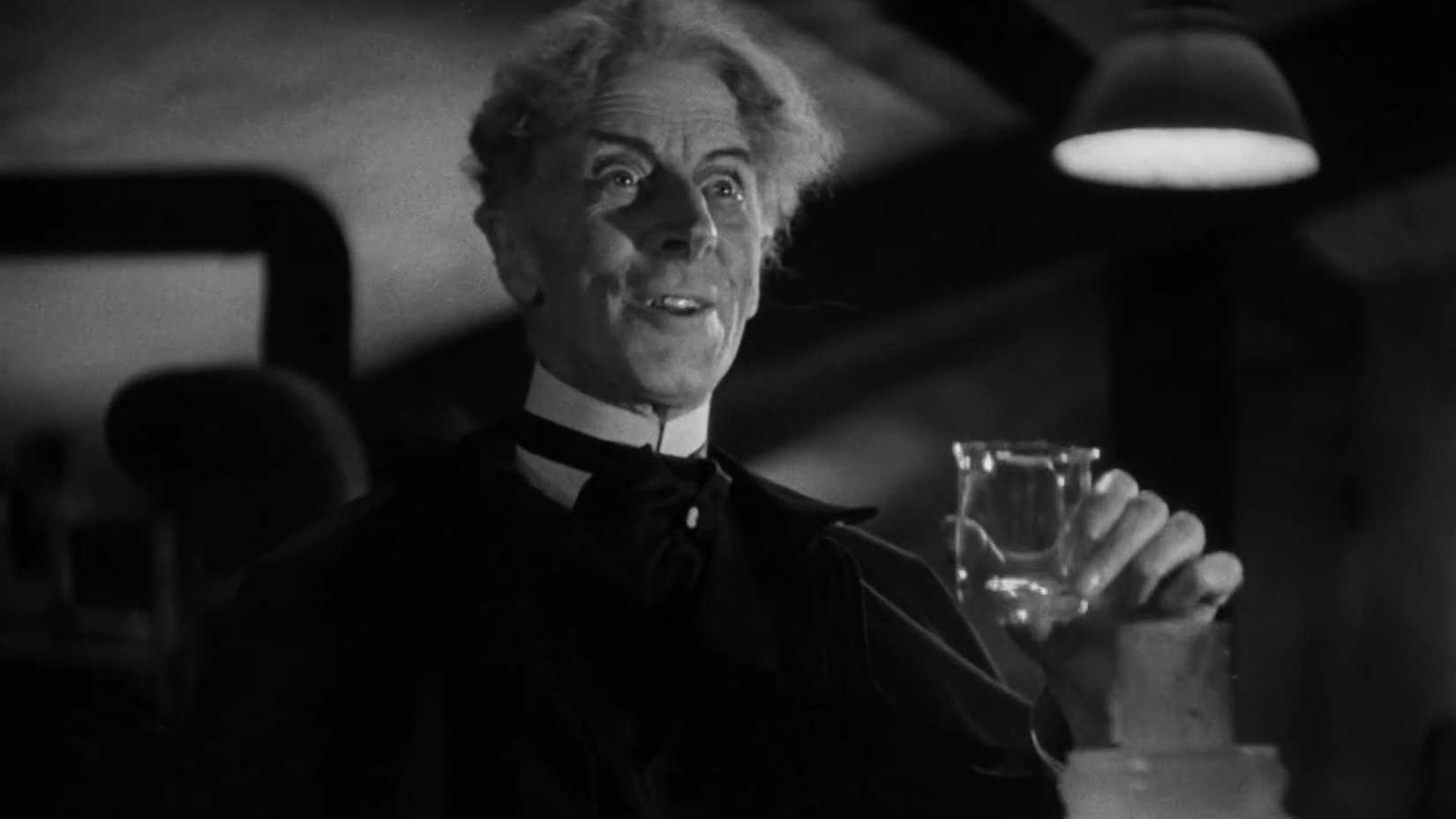 Doctor Septimus Pretorius toasts with Frankenstein in Bride of Frankenstein