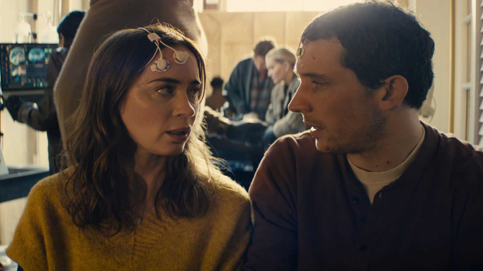 emily blunt and josh oconnor look at each other as they prepare for a test in disclosure day