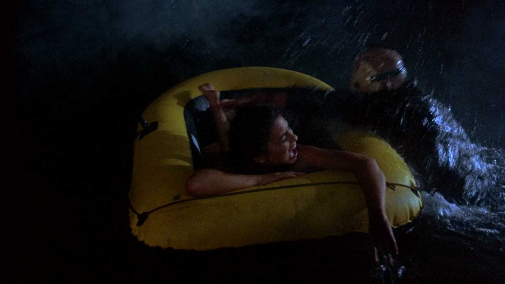 8 Friday the 13th Kills You Never Saw the Full Version Of 3 Friday the 13th, Sam is attacked while floating in a raft