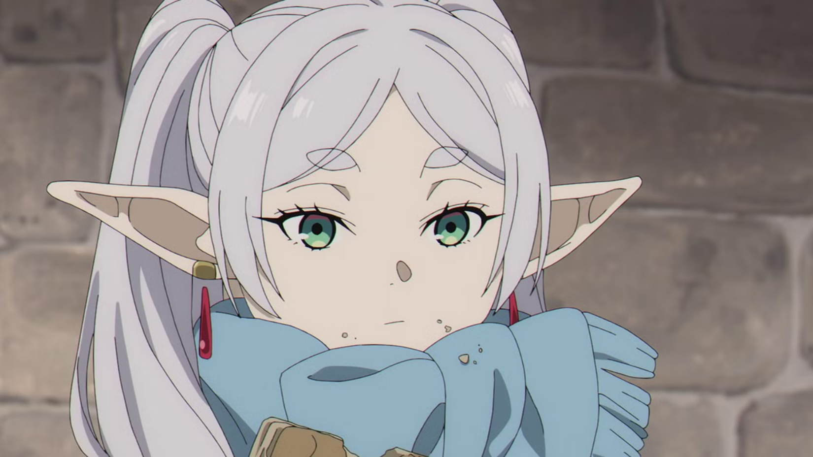 Frieren with crumbs on her mouth and scarf in Frieren Beyond Journey's End Season 2 anime