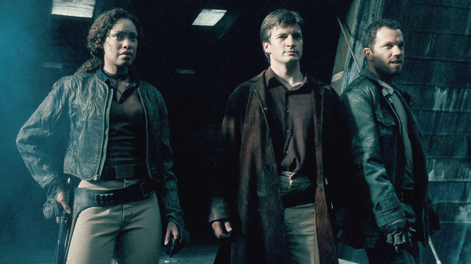 Netflix's Underrated 8-Part Sci-Fi Series Shows Firefly How It's Done 1 Gina Torres, Nathan Fillion, and Adam Baldwin in Firefly