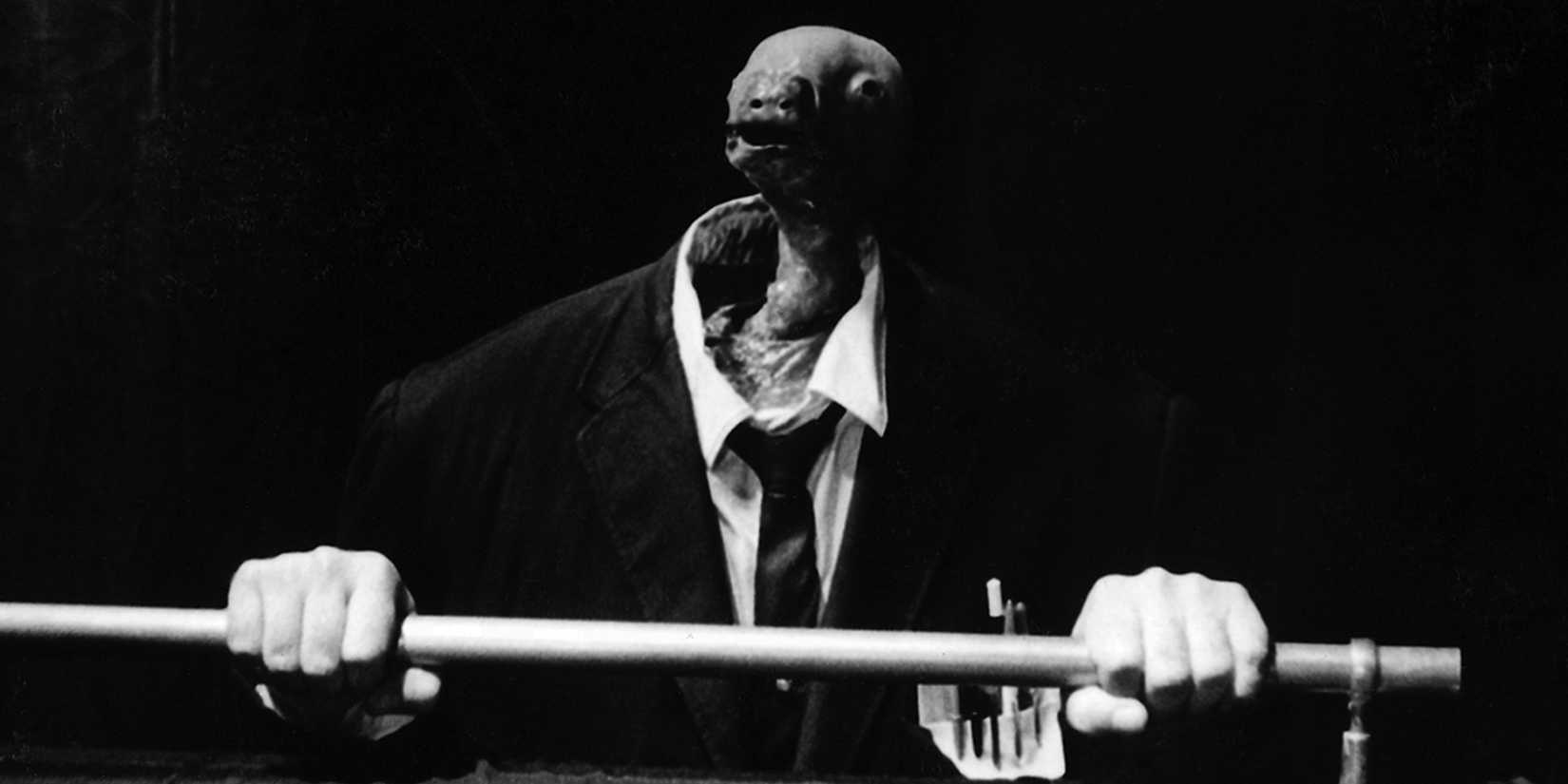 Henry with the baby's head in Eraserhead