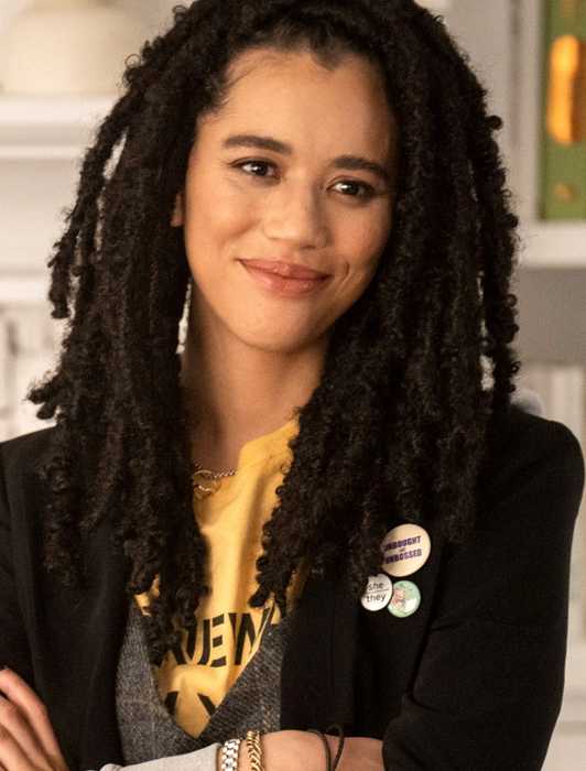 Jasmin Savoy Brown as Mindy crossing her arms and smiling in Scream 7